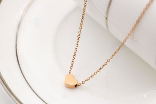 Gleaming Peach Heart Pendant Necklace: DivaSteel Clavicle Elegance